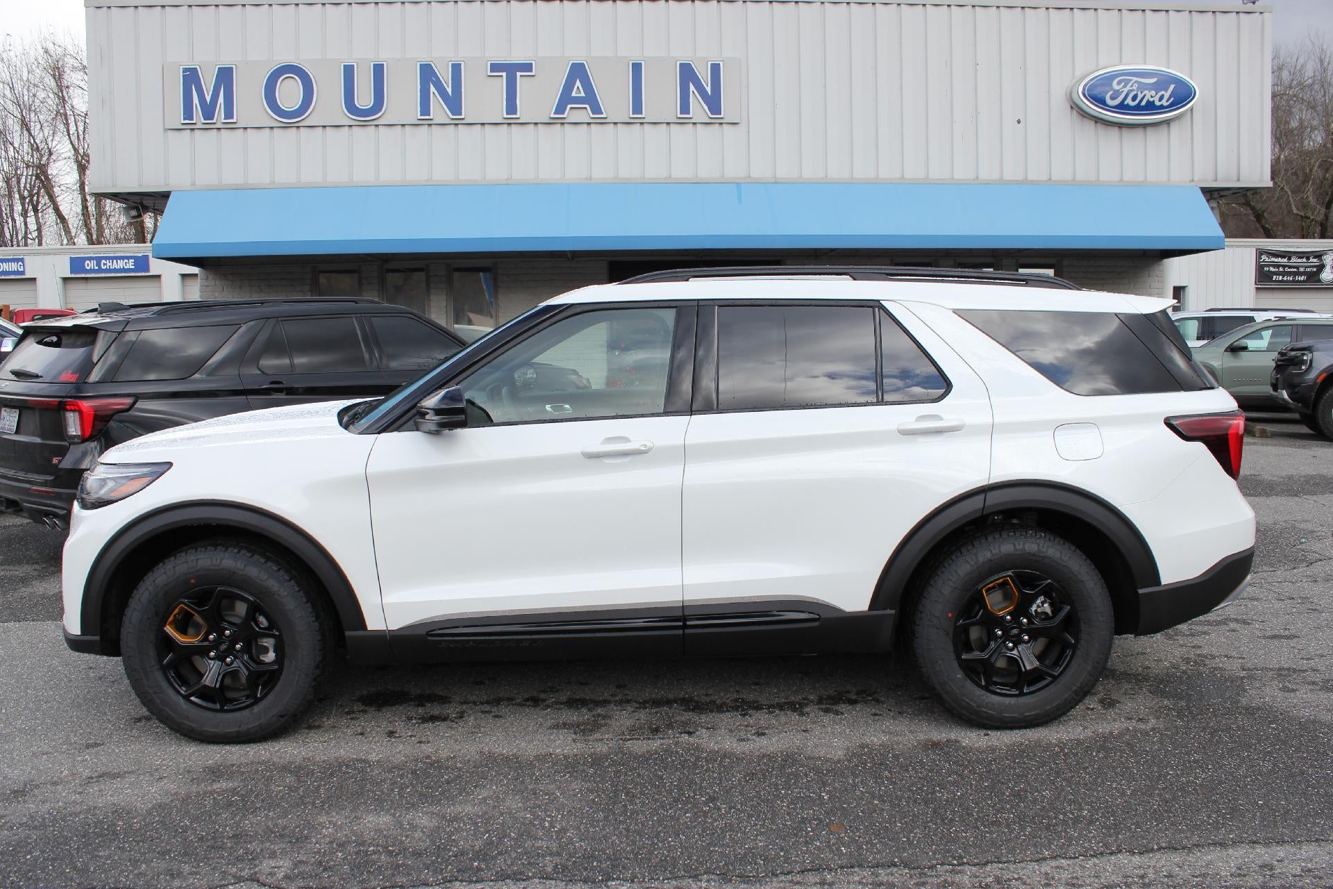 2026 Ford Explorer Tremor in Star White Metallic Tri-Coat — front three-quarter view