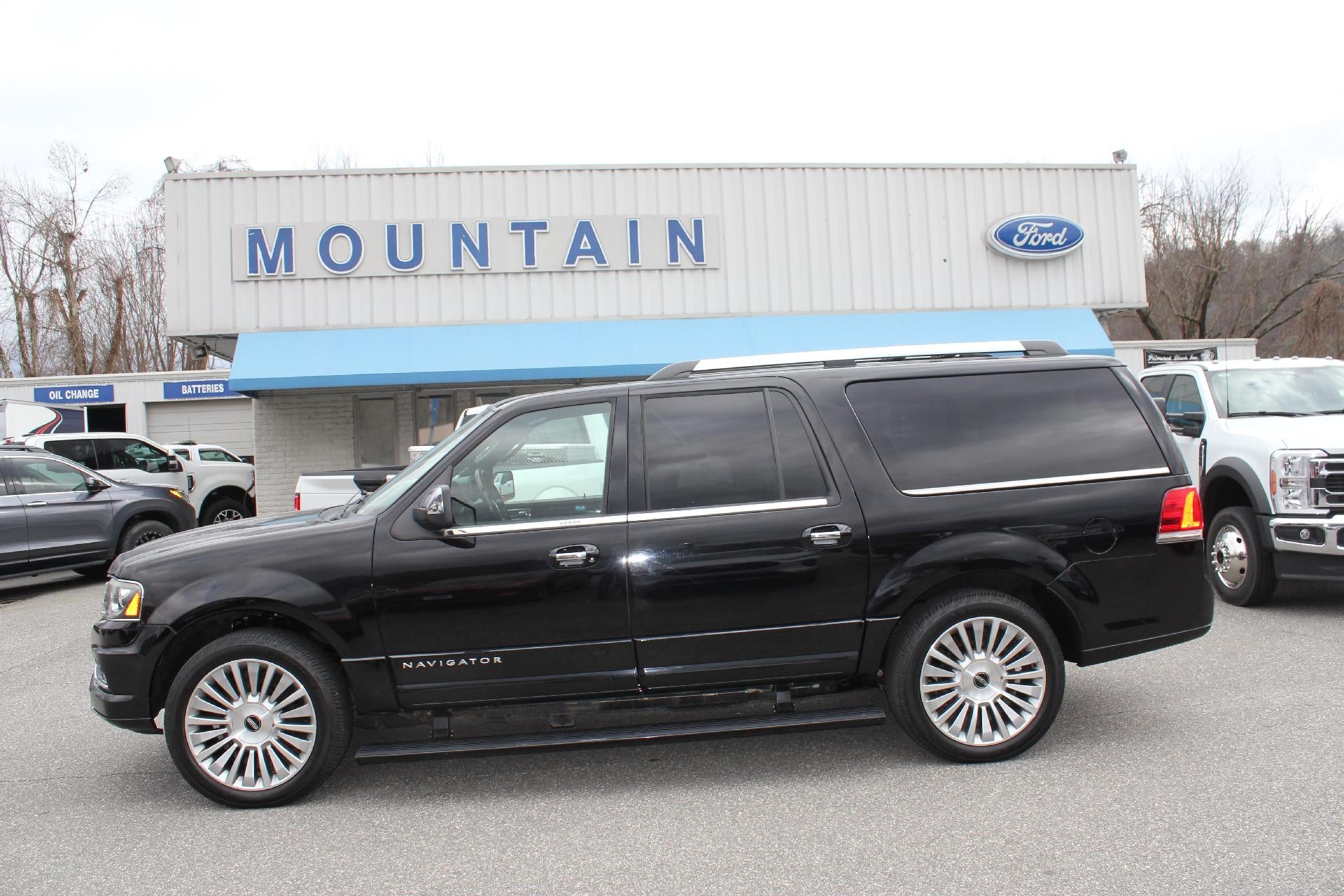 2017 Lincoln Navigator L Reserve in Black — front three-quarter view